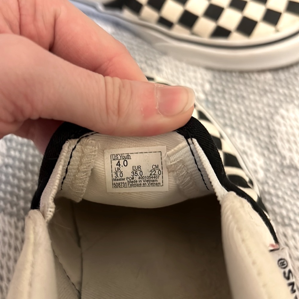 Vans black and white checkered slip-on